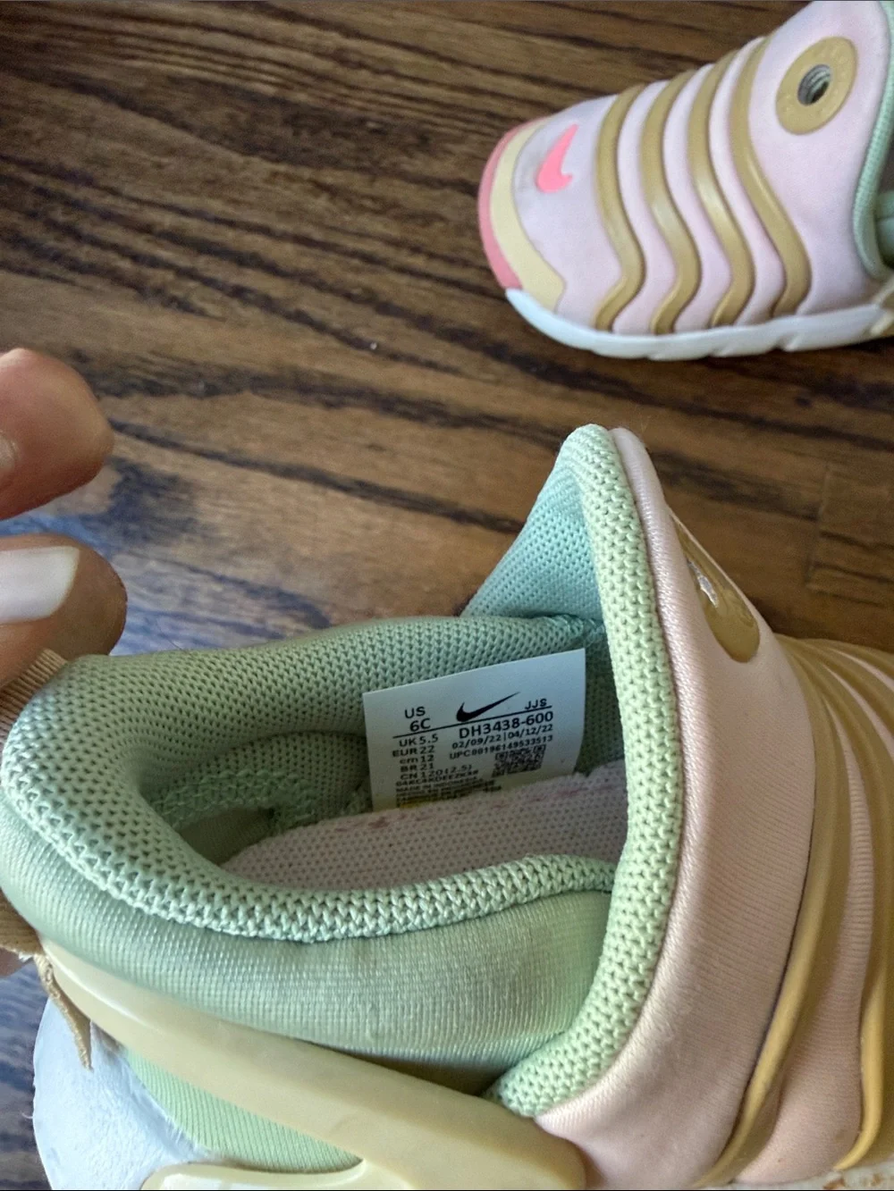 Pink and green Nike dynamo go